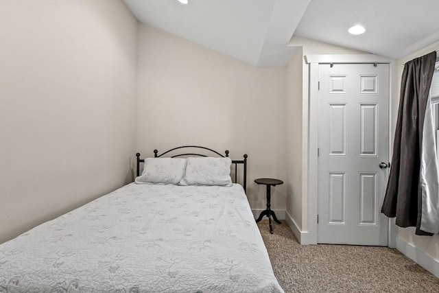 bedroom featuring recessed lighting, light carpet, vaulted ceiling, and baseboards