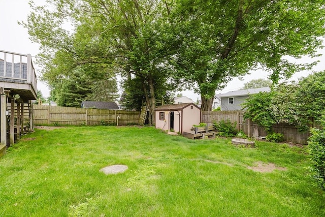 51 Jette St, Swansea, MA 02777 - fenced backyard featuring a storage unit