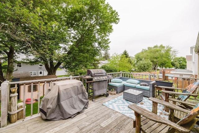 51 Jette St, Swansea, MA 02777 - wooden deck with an outdoor living space and grilling area