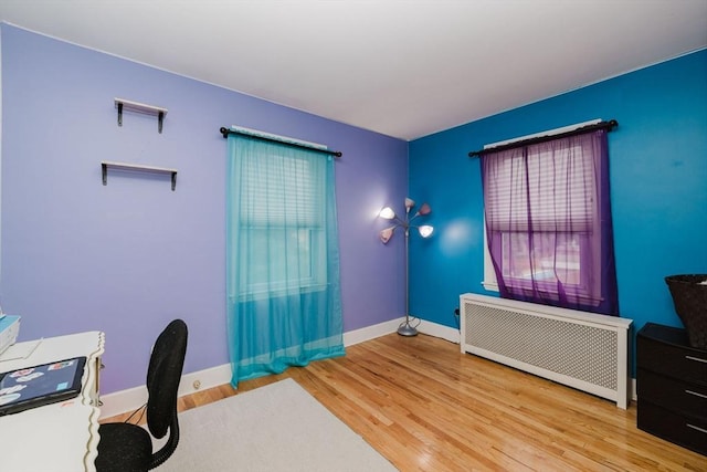51 Jette St, Swansea, MA 02777 - unfurnished office with radiator heating unit and wood finished floors