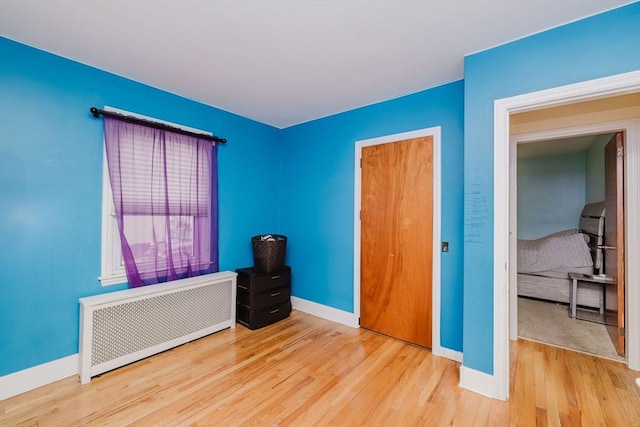 51 Jette St, Swansea, MA 02777 - unfurnished bedroom with radiator and wood finished floors