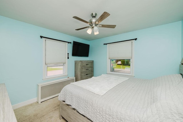 51 Jette St, Swansea, MA 02777 - bedroom featuring radiator, light carpet, and ceiling fan