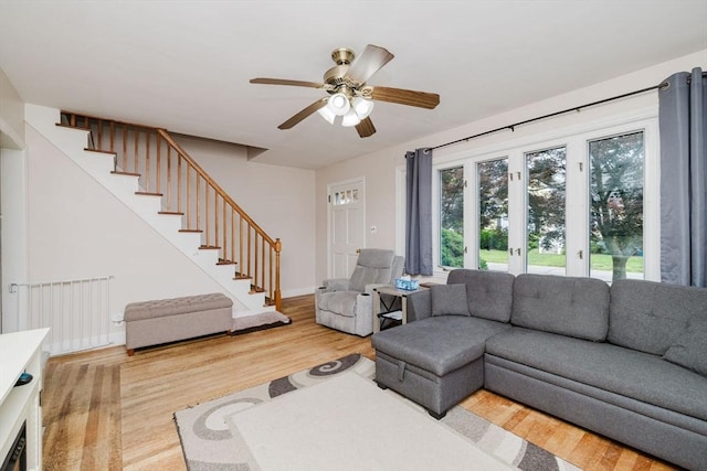 51 Jette St, Swansea, MA 02777 - living room with french doors, stairs, wood finished floors, and ceiling fan