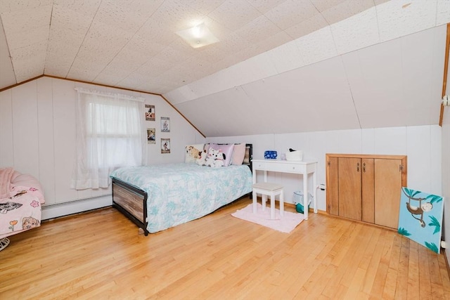 51 Jette St, Swansea, MA 02777 - bedroom with a baseboard heating unit, lofted ceiling, and light wood-type flooring