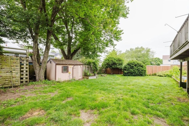 51 Jette St, Swansea, MA 02777 - fenced backyard featuring a storage unit