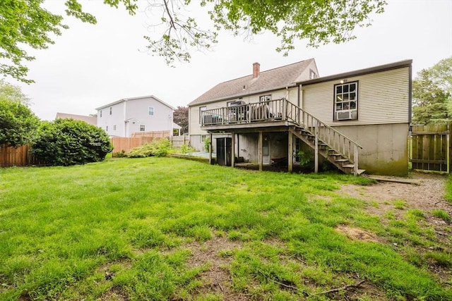 51 Jette St, Swansea, MA 02777 - back of house featuring stairway, a deck, a fenced backyard, and a chimney