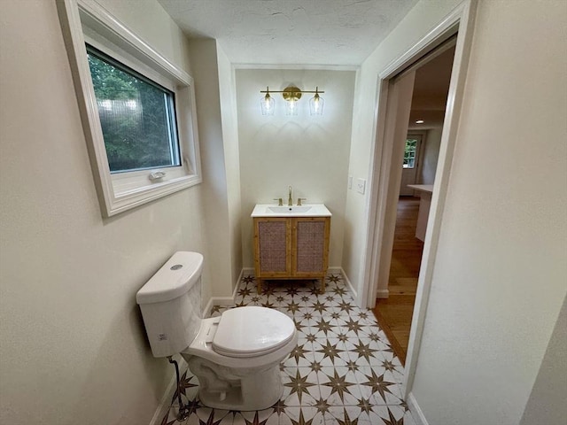 5 Mechanic St, Brookfield, MA 01506 - bathroom with toilet, baseboards, and vanity
