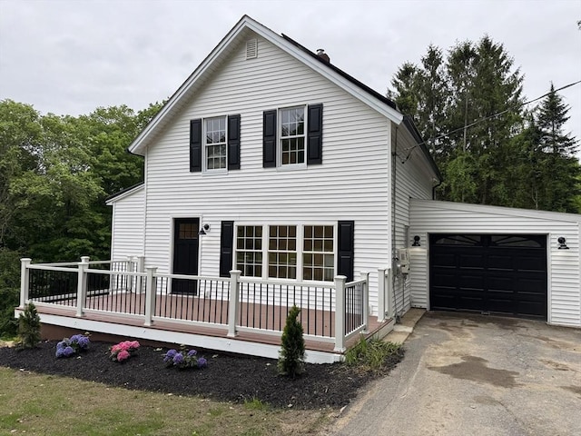 5 Mechanic St, Brookfield, MA 01506 - view of front of house with driveway, a garage, and a wooden deck