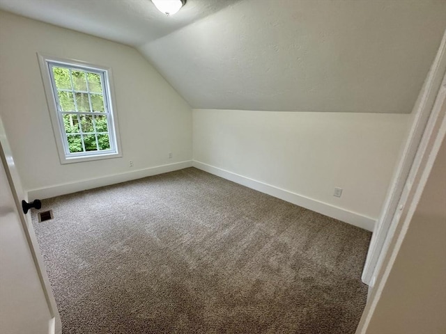 5 Mechanic St, Brookfield, MA 01506 - bonus room with baseboards, lofted ceiling, and carpet flooring