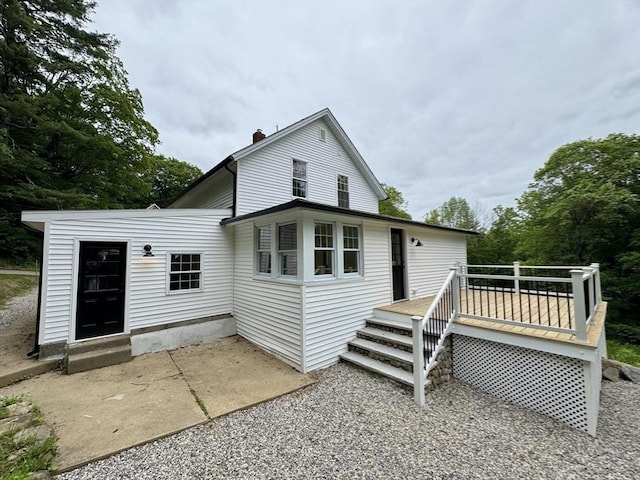 5 Mechanic St, Brookfield, MA 01506 - rear view of property with a wooden deck and a chimney