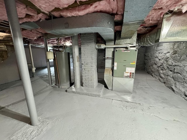 5 Mechanic St, Brookfield, MA 01506 - unfinished basement featuring gas water heater and heating unit