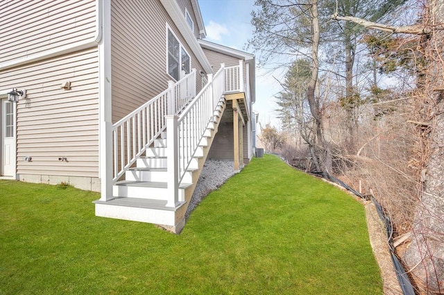 view of home's exterior featuring a lawn