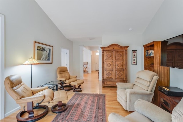 28 Picket Fence, Plymouth, MA 02360 - living area with light wood-style floors and vaulted ceiling