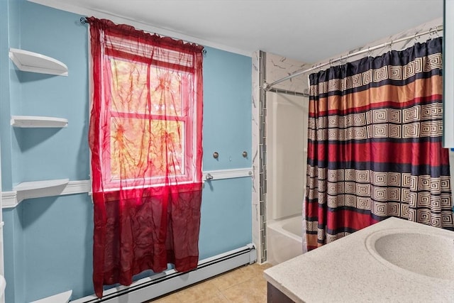 full bathroom featuring baseboard heating, tile patterned floors, shower / tub combo with curtain, and a sink