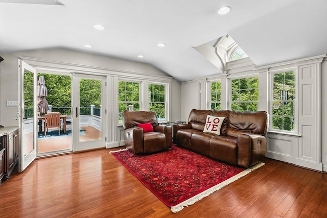 8 Knight Rd, Framingham, MA 01701 - living area featuring vaulted ceiling, wood finished floors, and recessed lighting