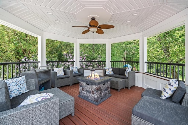 8 Knight Rd, Framingham, MA 01701 - wooden terrace with an outdoor living space with a fire pit and a ceiling fan