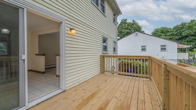 wooden terrace with baseboard heating