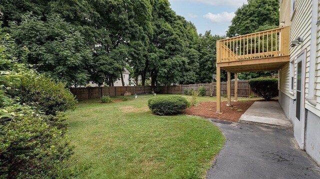 view of yard with a deck