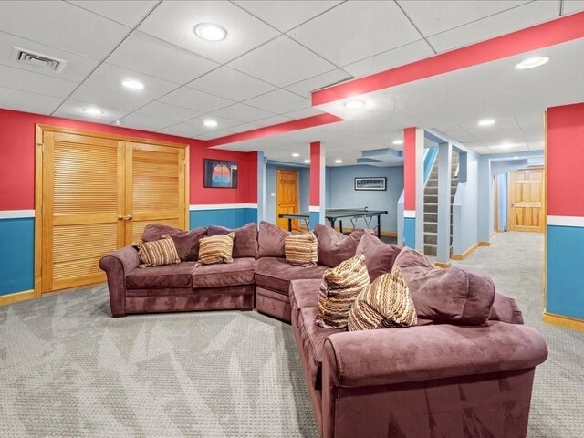 living room with baseboards, carpet flooring, recessed lighting, and visible vents