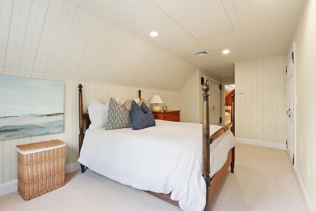 bedroom with visible vents, recessed lighting, lofted ceiling, and carpet floors