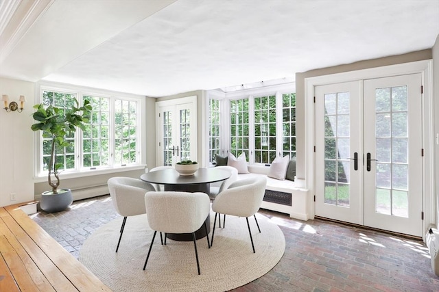 sunroom featuring french doors