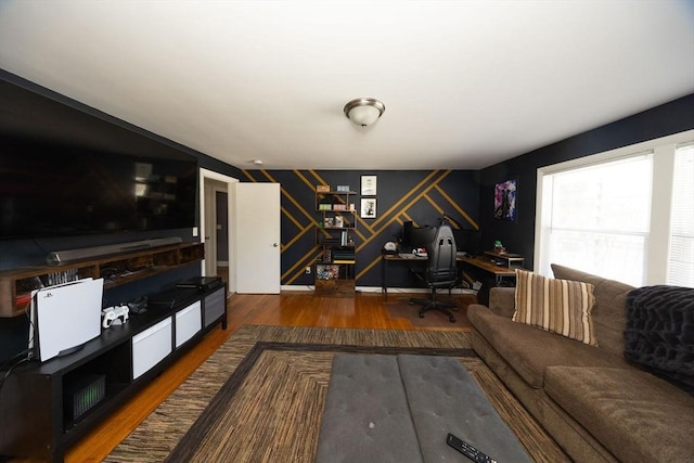 living room with stairs, baseboards, and wood finished floors