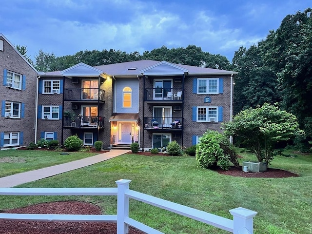 610 S Franklin St Unit F301, Holbrook, MA 02343 - view of front of home featuring a balcony and brick siding
