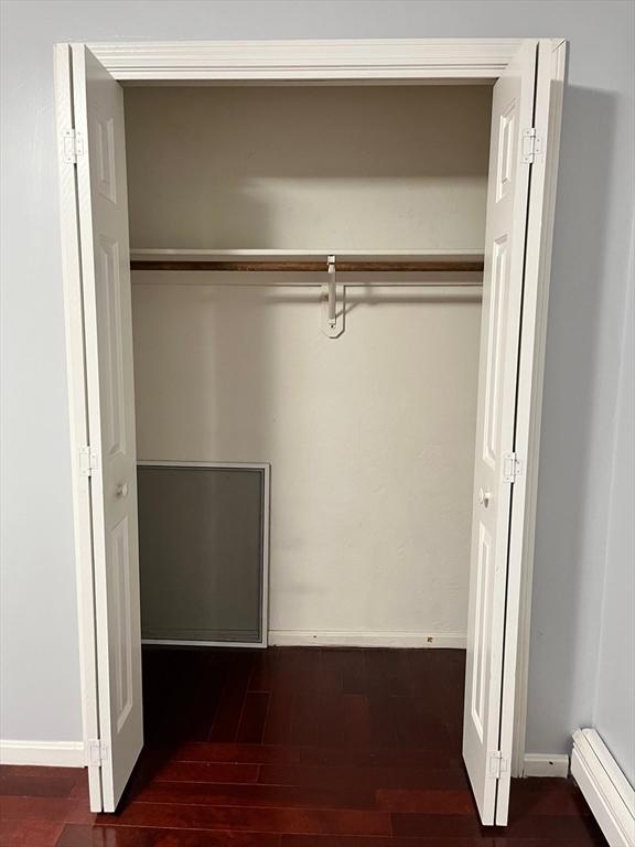 610 S Franklin St Unit F301, Holbrook, MA 02343 - closet featuring a baseboard heating unit