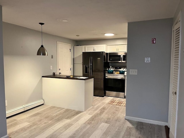 610 S Franklin St Unit F301, Holbrook, MA 02343 - kitchen featuring stainless steel appliances, baseboard heating, white cabinets, light wood finished floors, and a peninsula