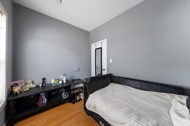 bedroom featuring light wood-style floors