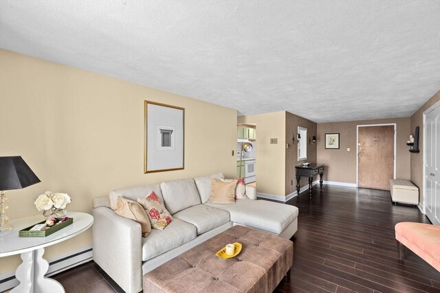 living room featuring baseboards, a baseboard radiator, a textured ceiling, and wood finished floors