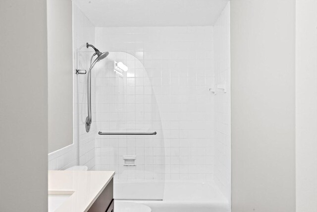 bathroom with vanity, shower / bathing tub combination, and toilet