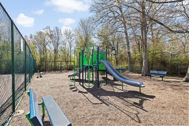 community playground featuring fence