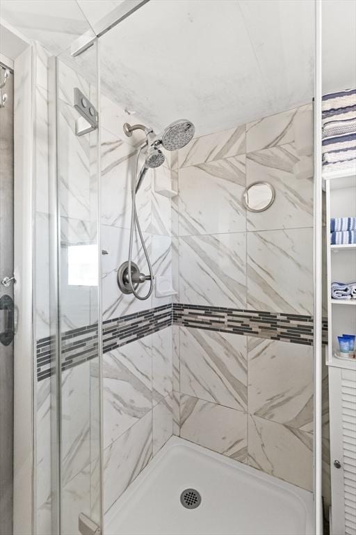 full bath featuring a stall shower