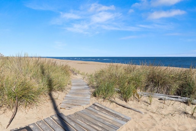 view of water feature with a beach view
