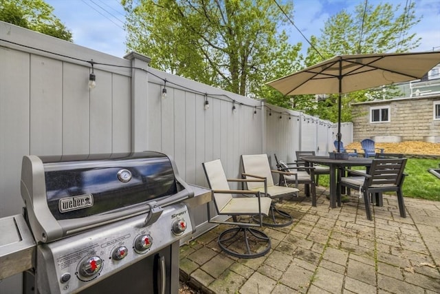 750 E 4th Unit 1, Boston, MA 02127 - view of patio / terrace featuring a grill, outdoor dining space, and a fenced backyard