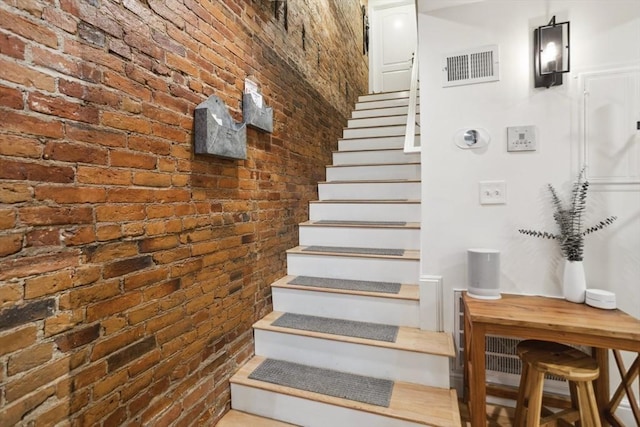 750 E 4th Unit 1, Boston, MA 02127 - stairway with brick wall