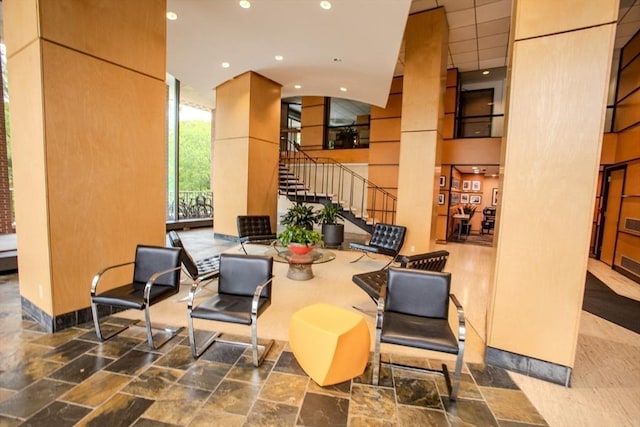 111 Perkins St Unit 42, Boston, MA 02130 - common area featuring stairway, recessed lighting, and a towering ceiling