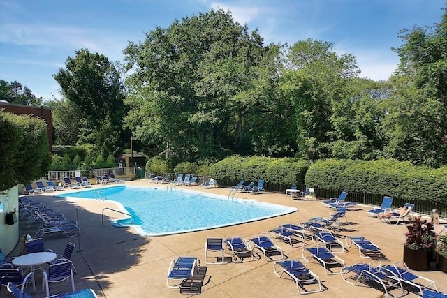 111 Perkins St Unit 42, Boston, MA 02130 - community pool with a patio area and view of wooded area