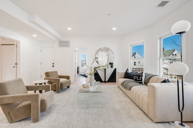 living room featuring light colored carpet