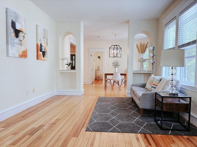 8 Fainwood Cir Unit 2, Cambridge, MA 02139 - living area featuring wood finished floors and arched walkways