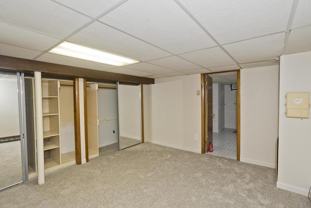 118 Woodland Rd, Springfield, MA 01129 - unfurnished bedroom featuring carpet floors, a paneled ceiling, and multiple closets