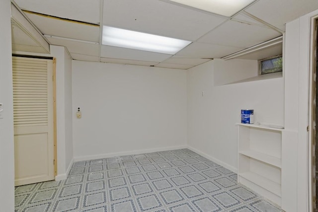 118 Woodland Rd, Springfield, MA 01129 - finished basement with a paneled ceiling and tile patterned floors