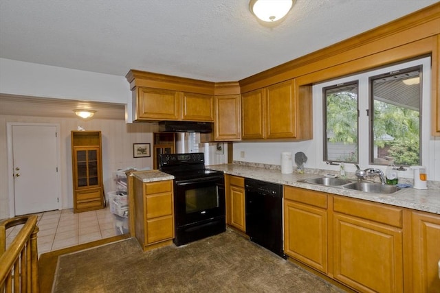 118 Woodland Rd, Springfield, MA 01129 - kitchen featuring black appliances, under cabinet range hood, light countertops, brown cabinets, and a textured ceiling