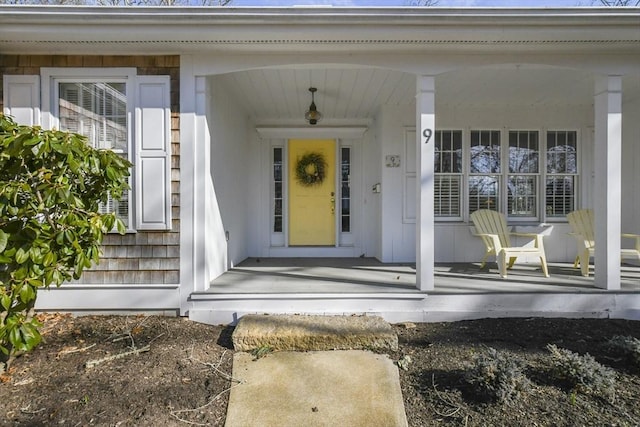 entrance to property with a porch