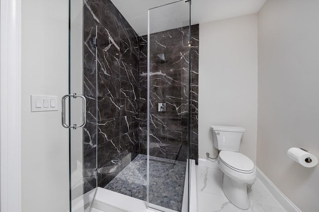 full bath featuring marble finish flooring, toilet, a marble finish shower, and baseboards