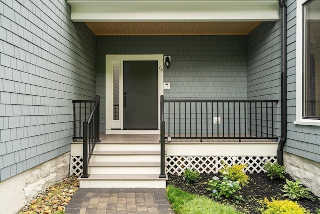 property entrance with covered porch