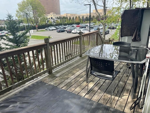 deck featuring outdoor dining area