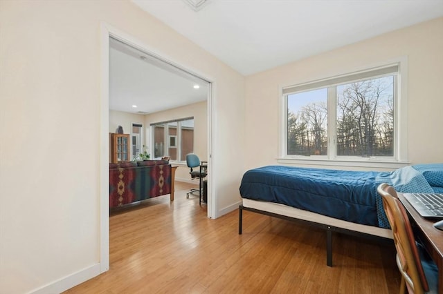 bedroom with light wood-type flooring