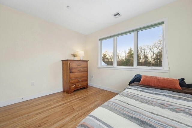 bedroom featuring light hardwood / wood-style flooring